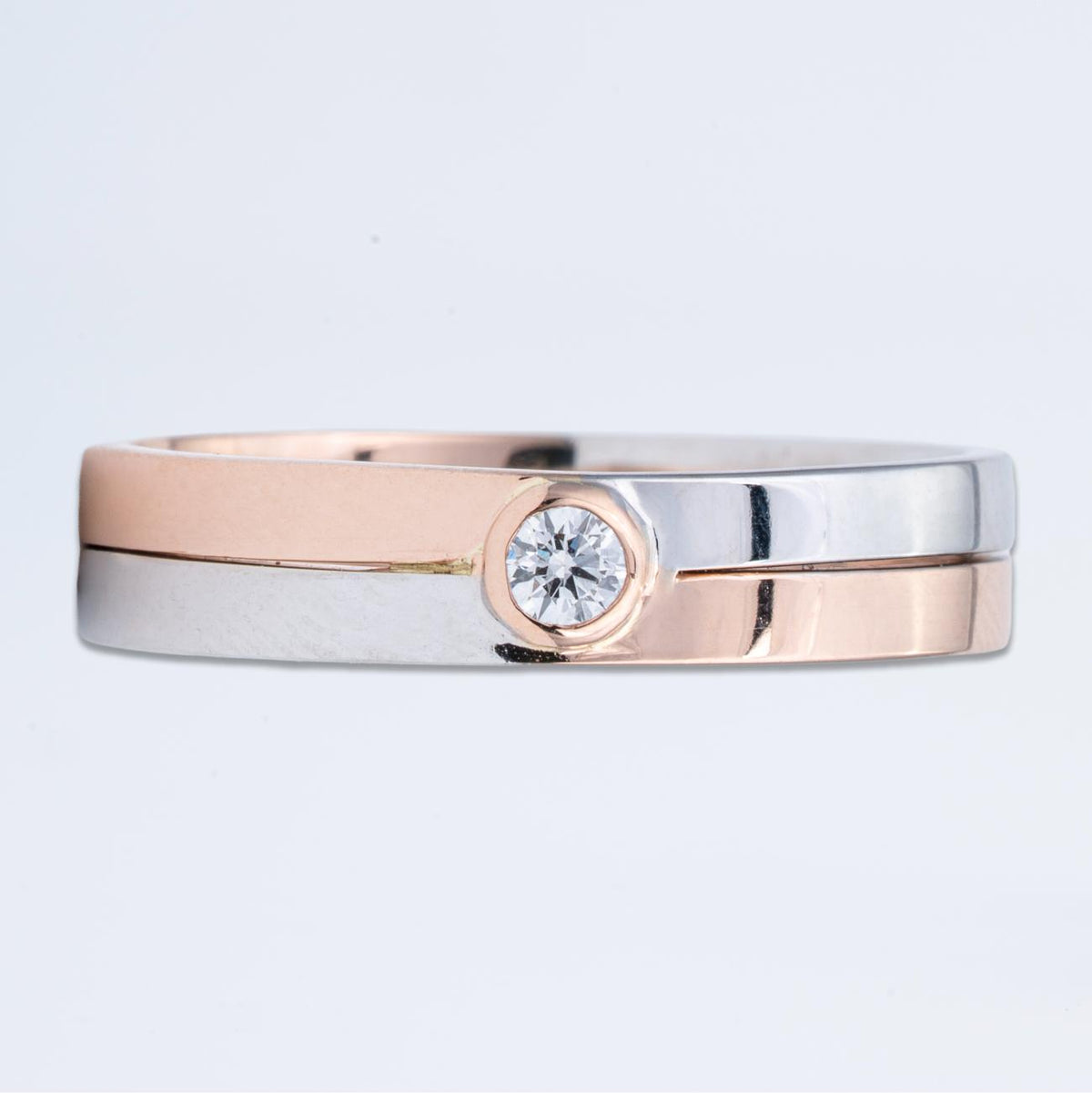 Two-Tone 14K Gold Step Interlocking Diamond Solitaire Band Ring