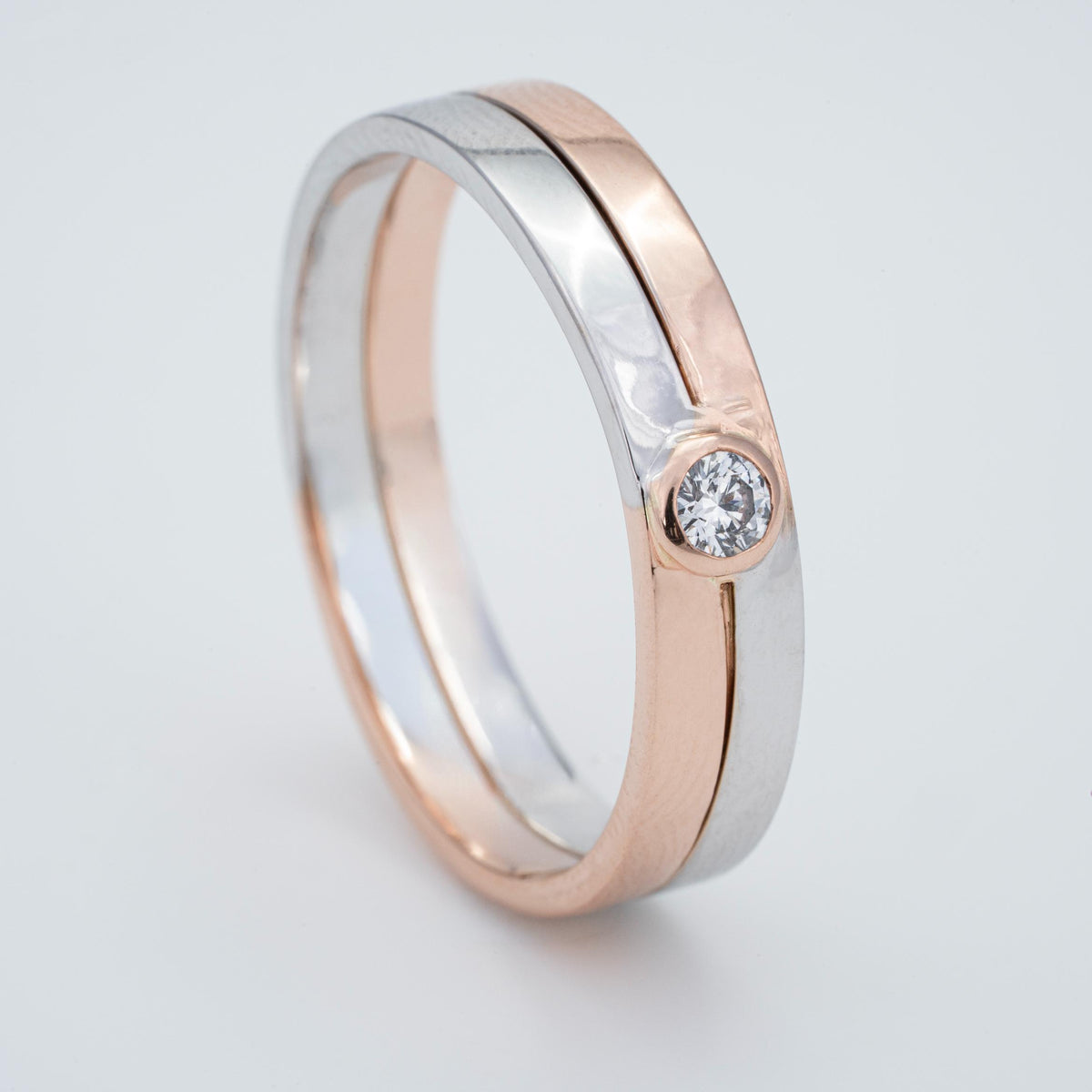 Two-Tone 14K Gold Step Interlocking Diamond Solitaire Band Ring
